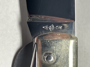 Bauernmesser Logo Pfeil durch Zielscheibe